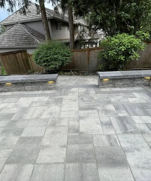 Installation of pavers. Retaining wall. Children's play area and installation of lights in Snohomish 